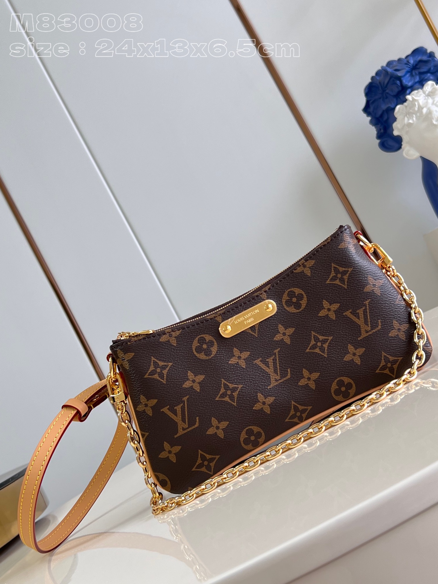 Louis Vuitton Cowhide Leather Clutch with Double Zipper and Gold Tone Panels