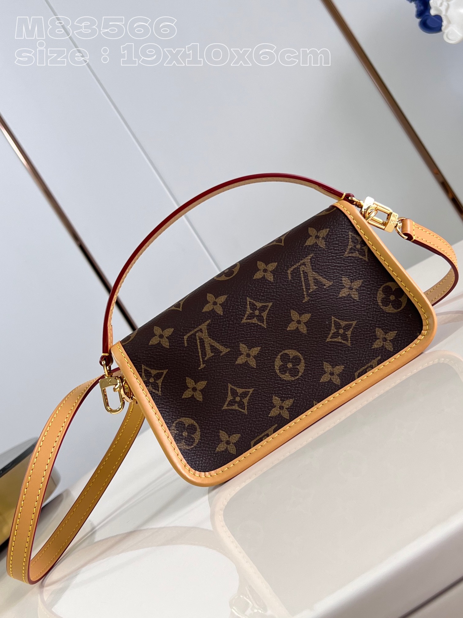 Louis Vuitton Nano Diane with leather strap and traditional buckle flap canvas bag