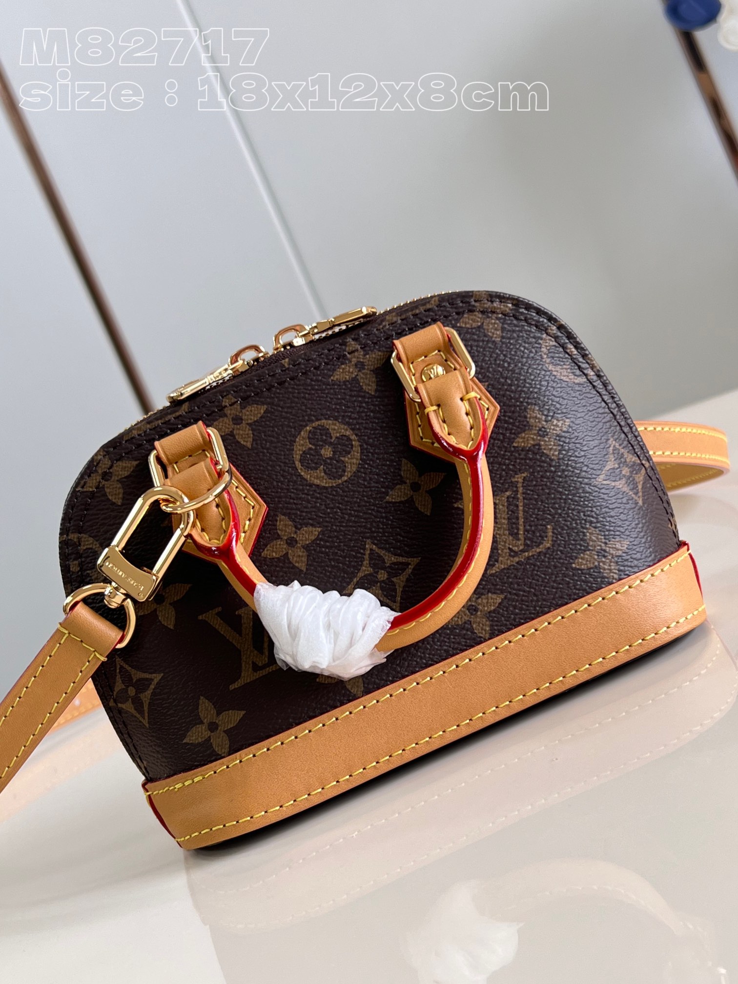 Louis Vuitton Nano Alma Pocket Bag