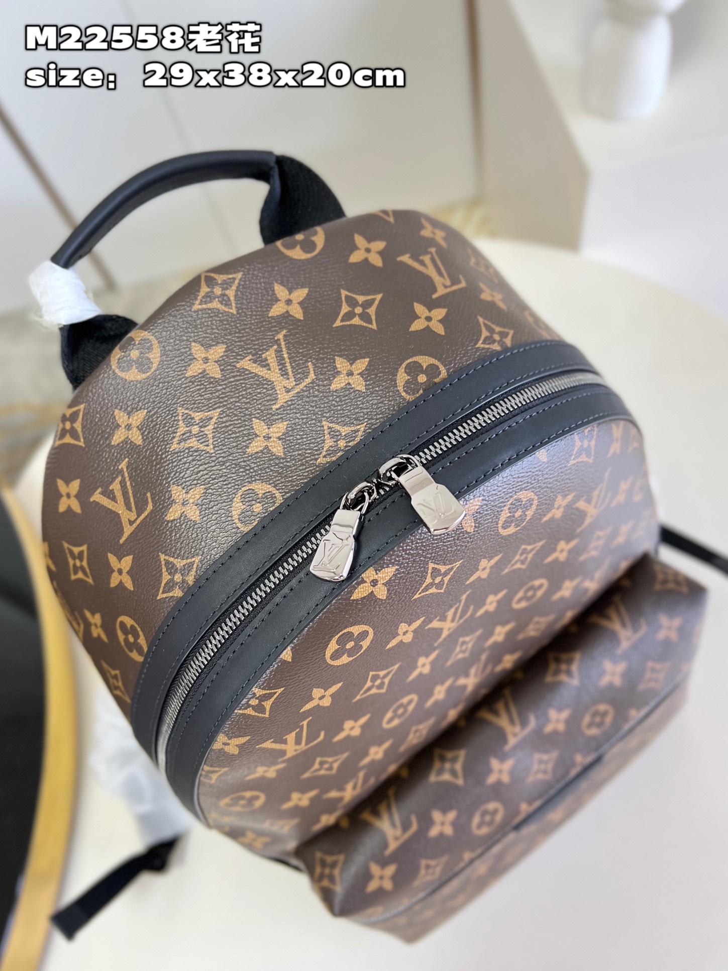 Louis Vuitton M22558 Discovery small compact shoulder bag in Monogram Eclipse canvas.