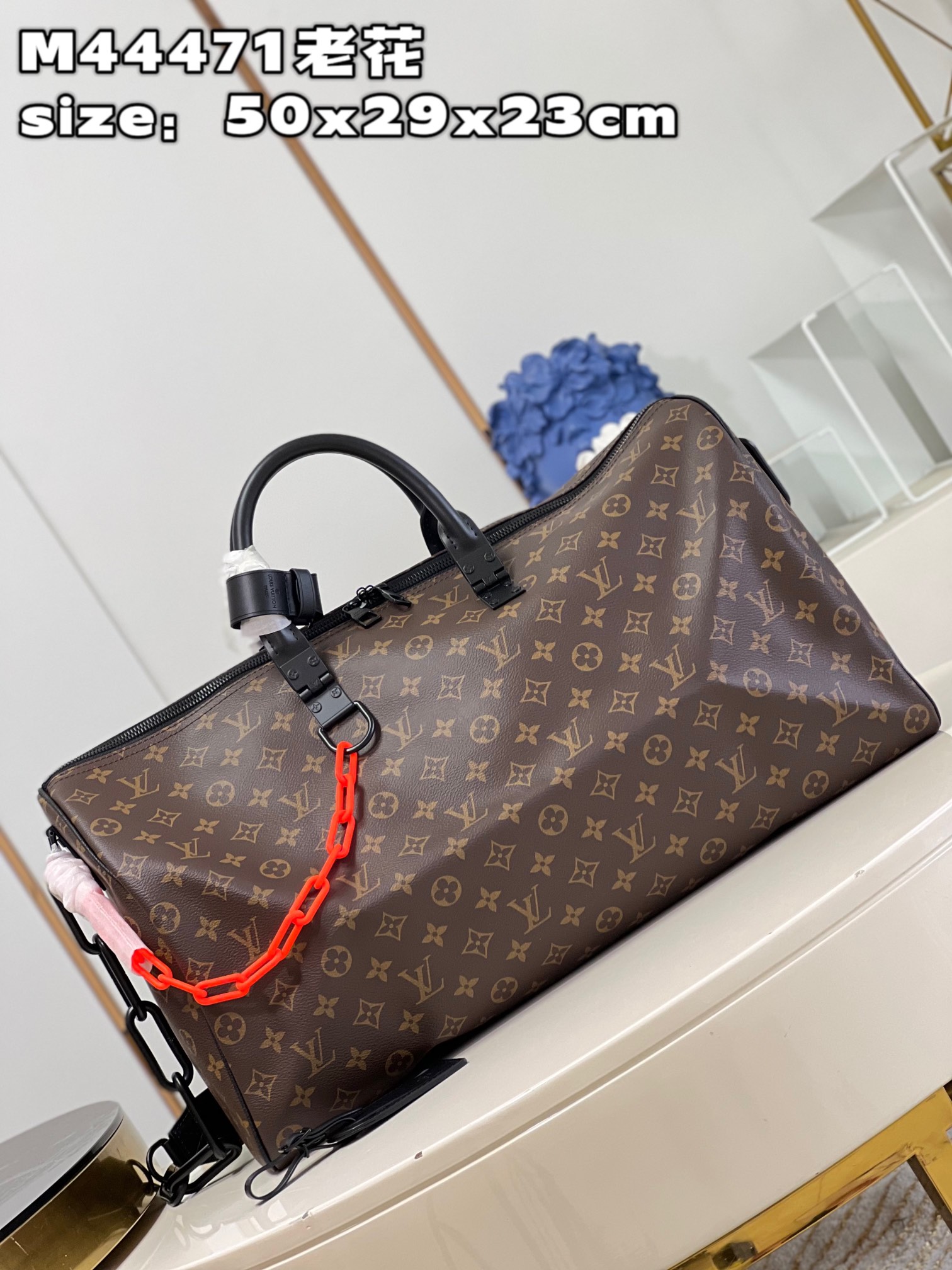 Louis Vuitton M44471 Iconic Monogram pattern with matte orange chain strapKEEPALL 50 travel bag