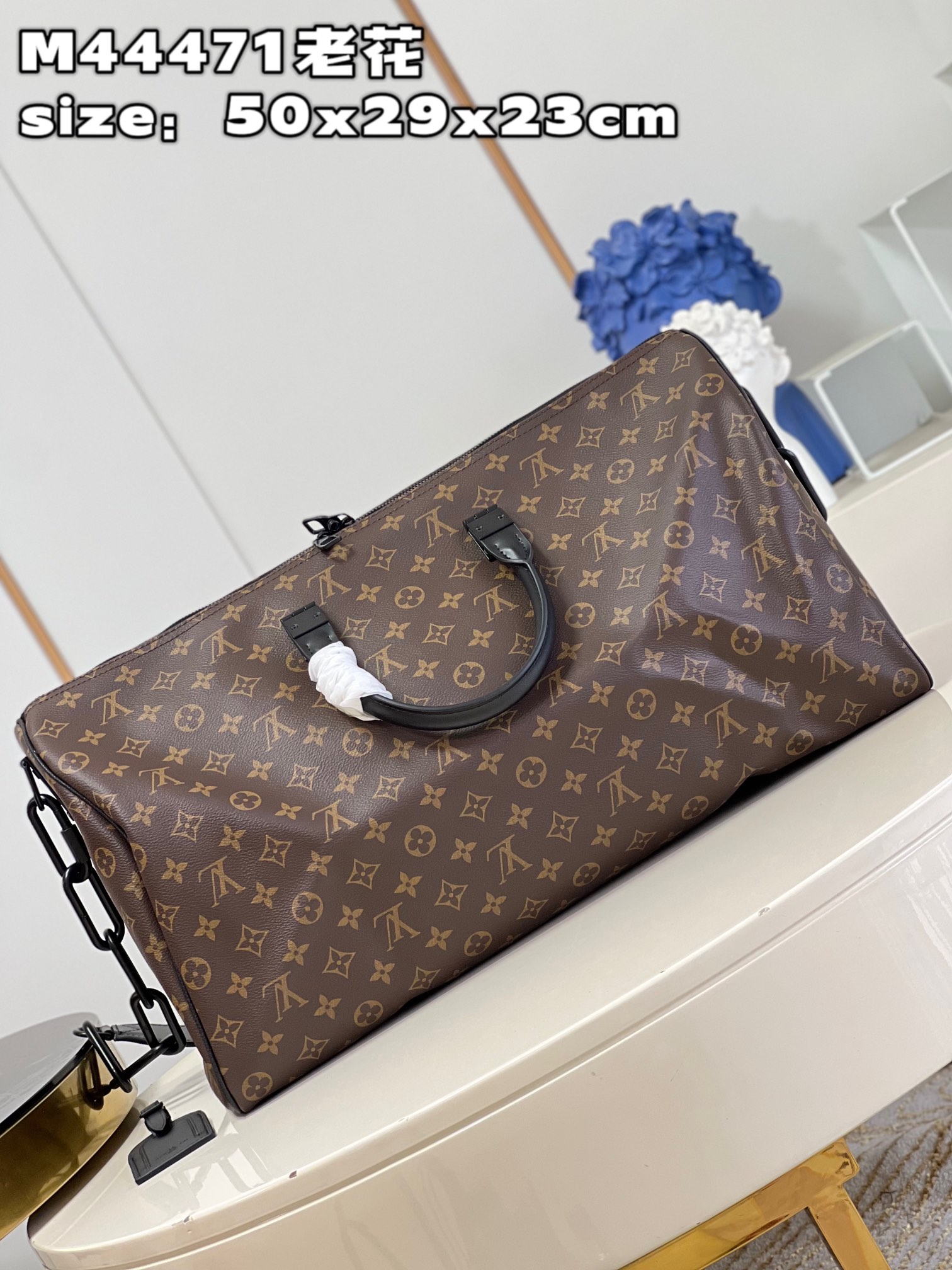 Louis Vuitton M44471 Iconic Monogram pattern with matte orange chain strapKEEPALL 50 travel bag