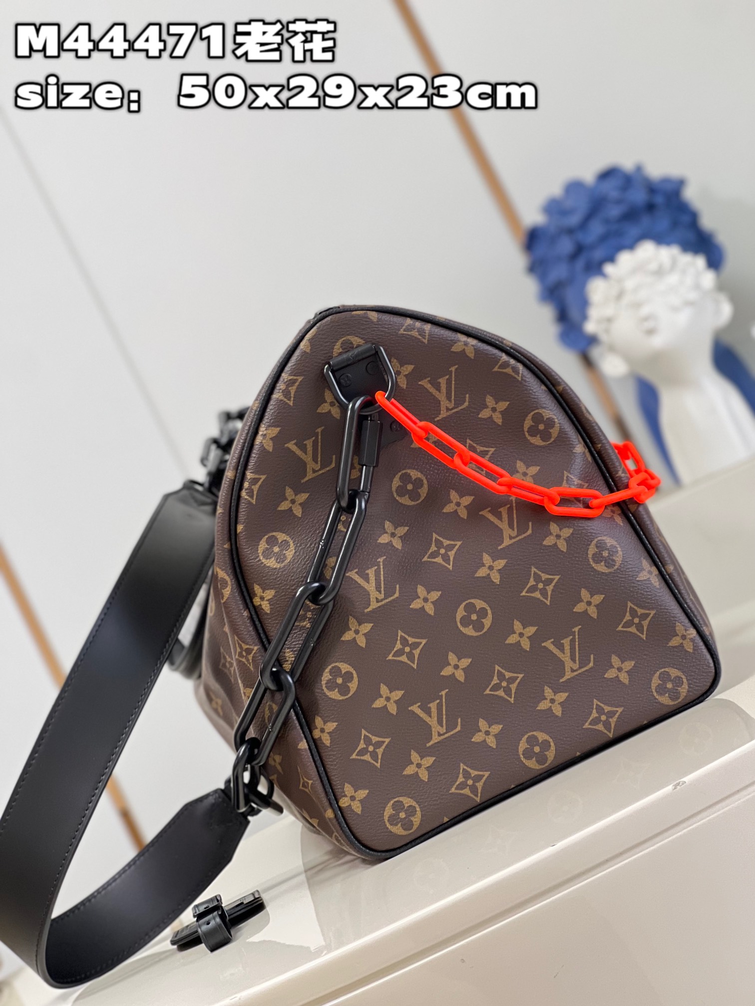 Louis Vuitton M44471 Iconic Monogram pattern with matte orange chain strapKEEPALL 50 travel bag