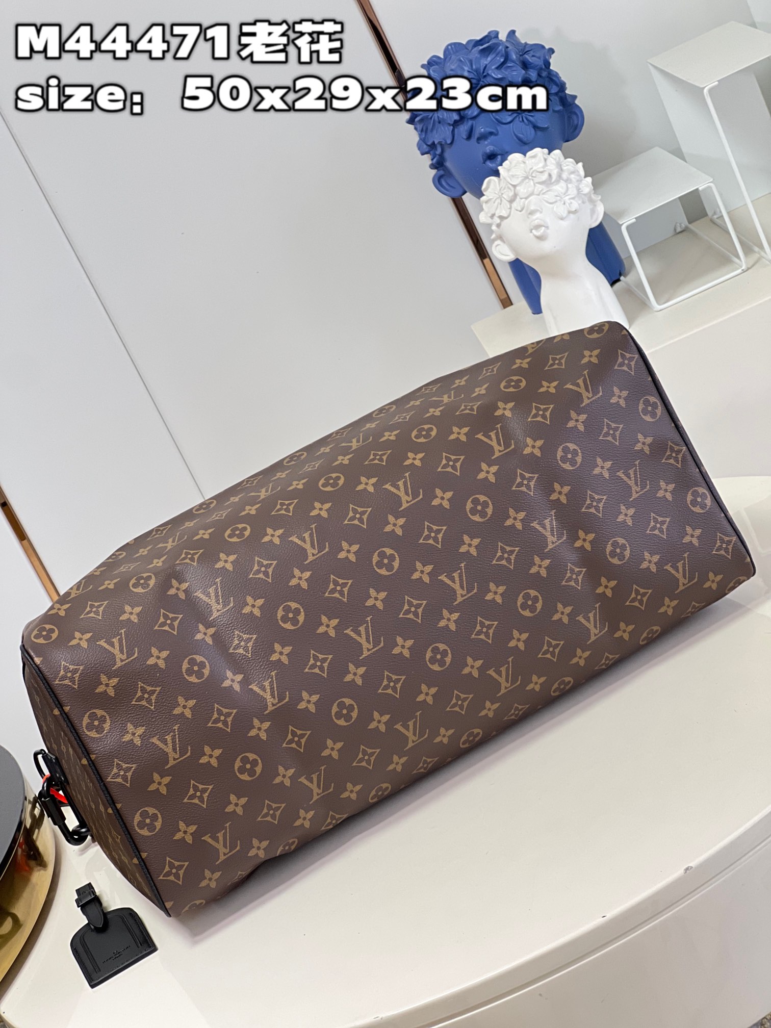 Louis Vuitton M44471 Iconic Monogram pattern with matte orange chain strapKEEPALL 50 travel bag