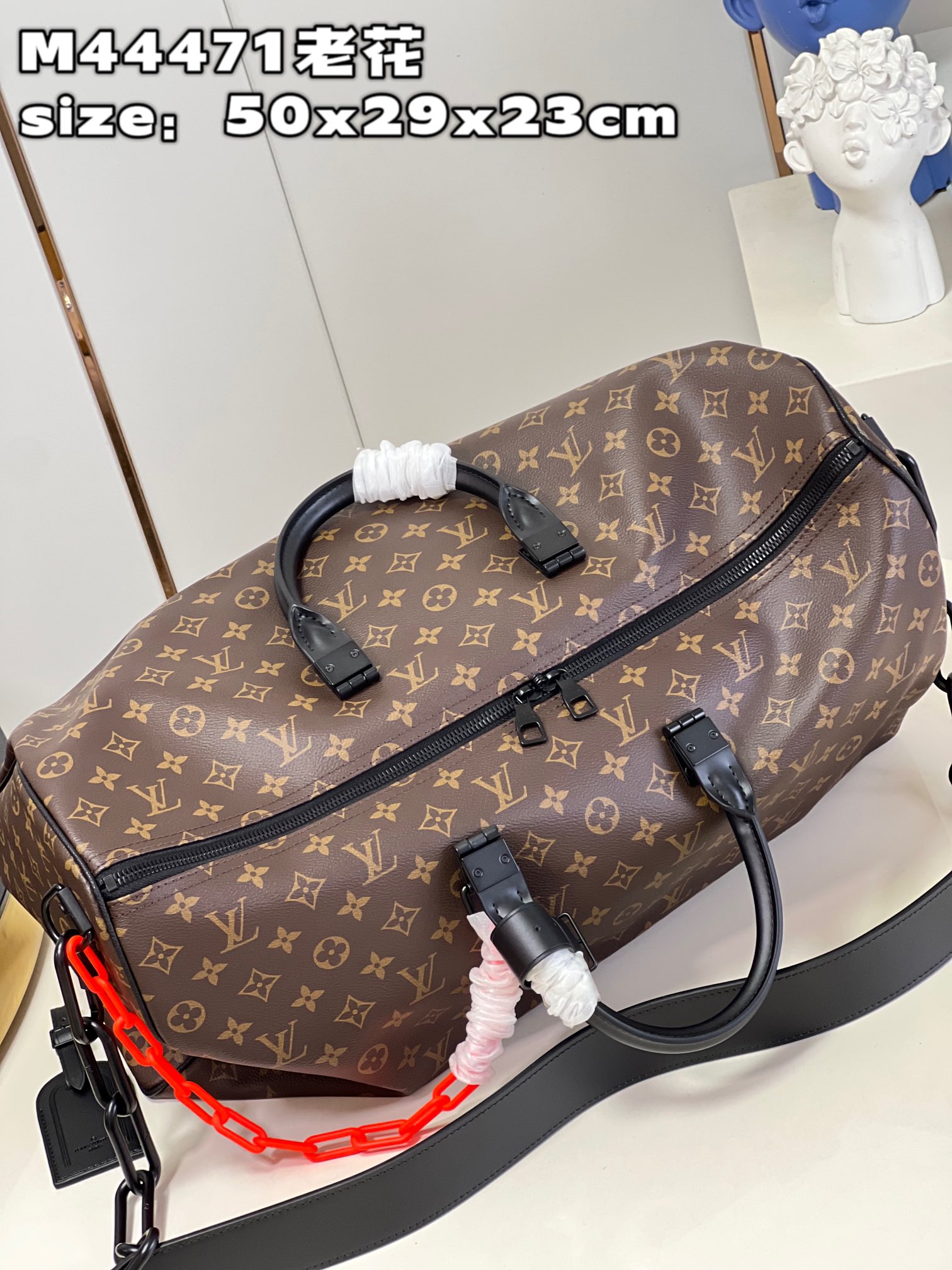 Louis Vuitton M44471 Iconic Monogram pattern with matte orange chain strapKEEPALL 50 travel bag