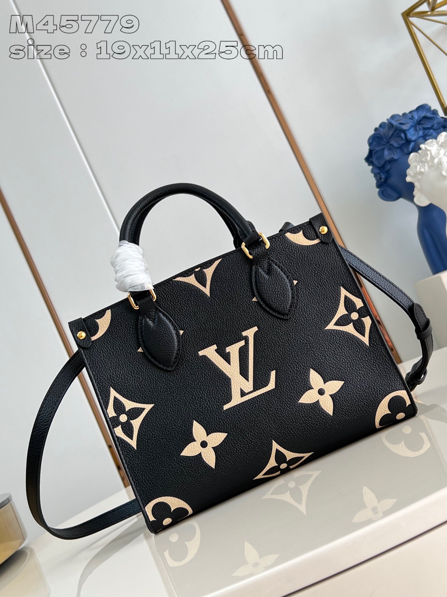 Louis Vuitton M45779 OnTheGo Black small pouch in Monogram Empreinte leather embossed with Medium Bicolor Monogram pattern