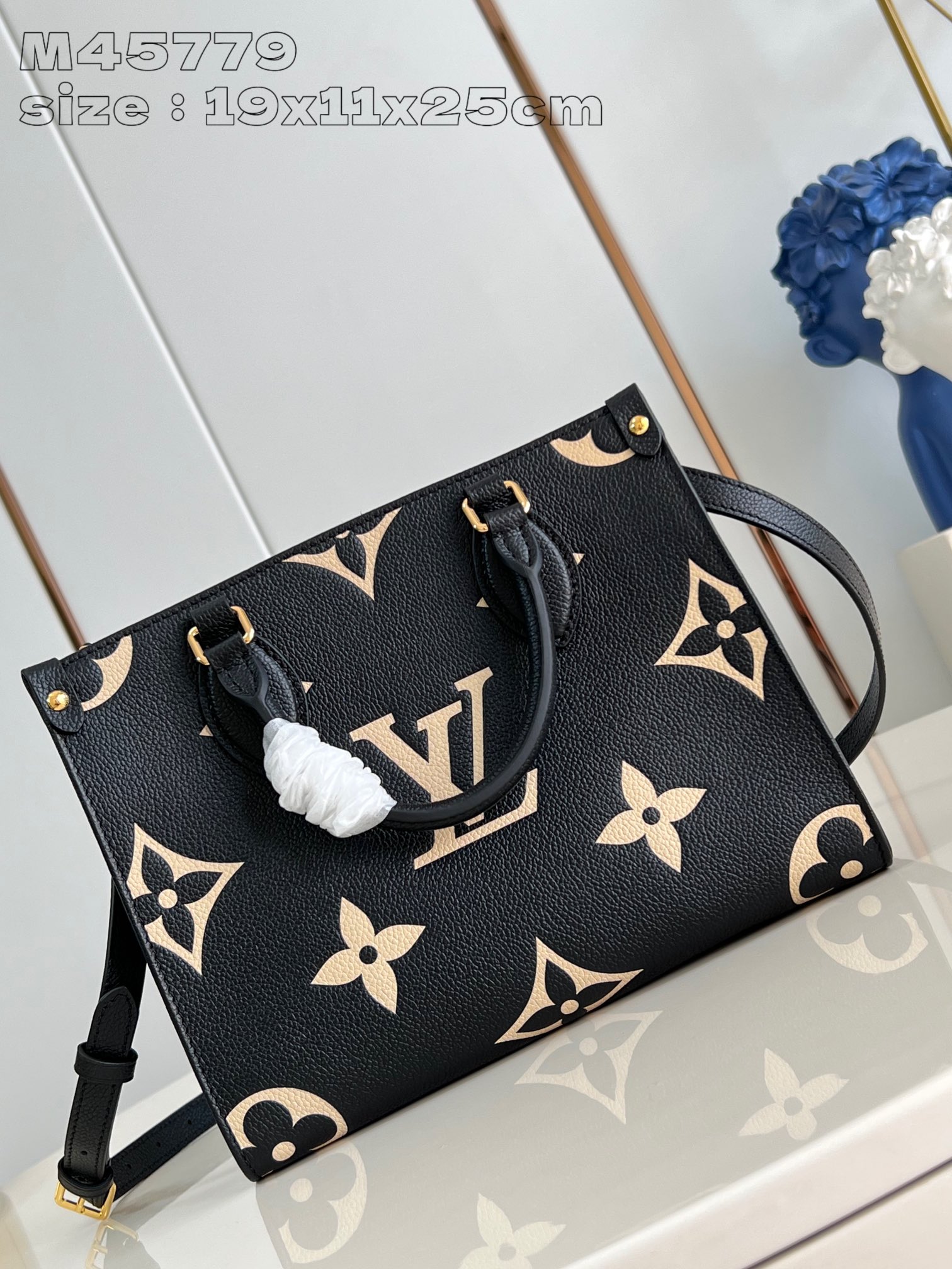 Louis Vuitton M45779 OnTheGo Black small pouch in Monogram Empreinte leather embossed with Medium Bicolor Monogram pattern