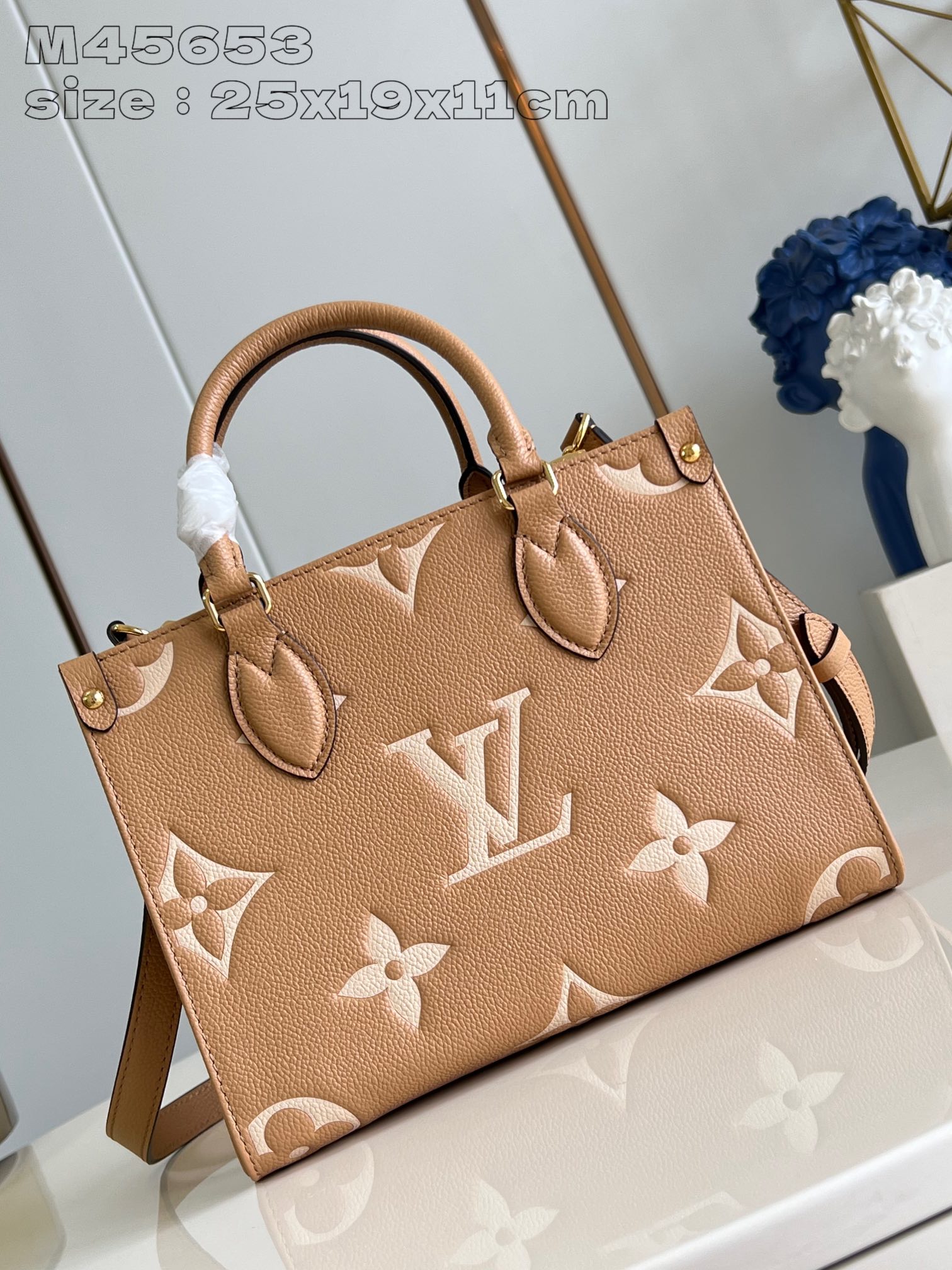 Louis Vuitton M45653 OnTheGo Small Tote in Monogram Empreinte Leather Embossed with Giant Bicolor Monogram Pattern in Light Yellow