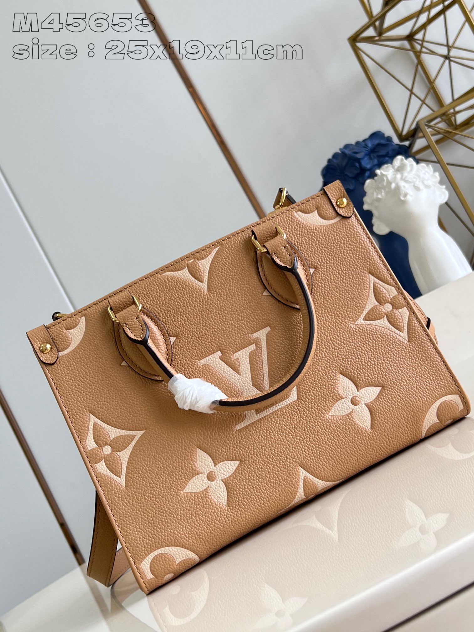 Louis Vuitton M45653 OnTheGo Small Tote in Monogram Empreinte Leather Embossed with Giant Bicolor Monogram Pattern in Light Yellow