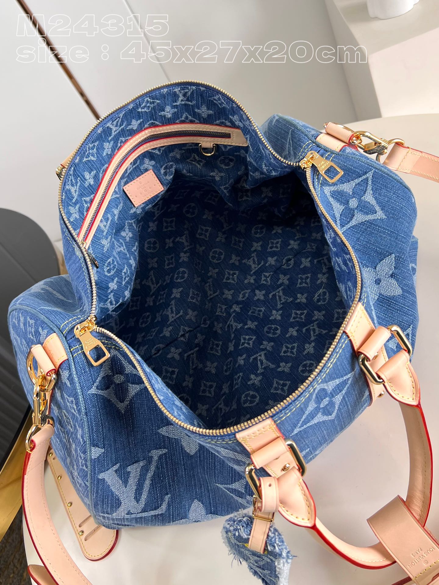 Louis Vuitton M24315 Keepall Bandoulière travel bag in Monogram Denim fabric