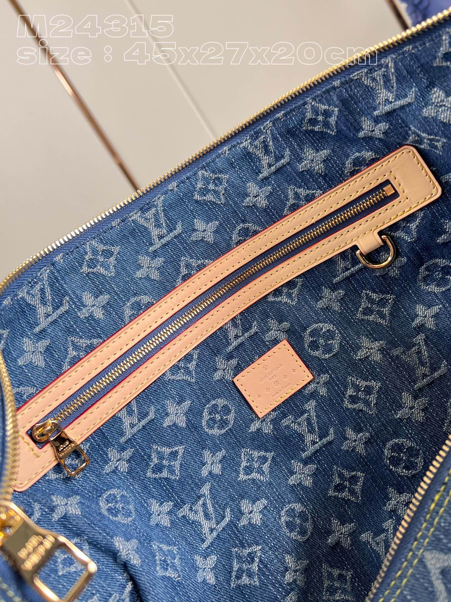 Louis Vuitton M24315 Keepall Bandoulière travel bag in Monogram Denim fabric